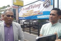 Syamsu Saladin, Kuasa Hukum PT Baramarta (kiri) dan Panit Saiber Dit Reskrimsus Polda Kalsel, Iptu Dedi Sugiarto, Foto ZI