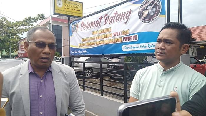 Syamsu Saladin, Kuasa Hukum PT Baramarta (kiri) dan Panit Saiber Dit Reskrimsus Polda Kalsel, Iptu Dedi Sugiarto, Foto ZI