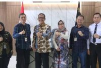 Jajaran Kemenkumham bersama pihak Bank Kalsel berfoto bersama. Jumat (28/4/2023). Foto Ist