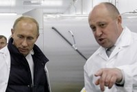 Presiden Vladimir Putin dan Pendiri Wagner Group Yevgeny Prigozhin. (Foto: AFP PHOTO)