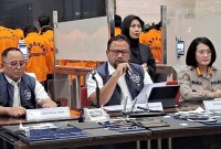 Direktur Tindak Pidana Siber Bareskrim Polri Brigjen Adi Vivid memberikan keterangan konferensi pers dalam penggerebekan markas judi online di wilayah Denpasar, Bali. dan 31 tersangka ditangkap dalam penggerebekan tersebut, Rabu (30/8/2023).(Foto: VOI-Rizky Adytia)
