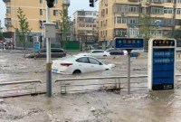Banjir akibat hujan lebat dan topan doksuri di Beijing, China, Selasa (1/8/2023). (Foto: REUTERS)