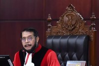 KETUA MK Anwar Usman didesak untuk dipecat oleh 16 guru besar dan pengajar hukum tata negara. (Antara/Sigid Kurniawan)