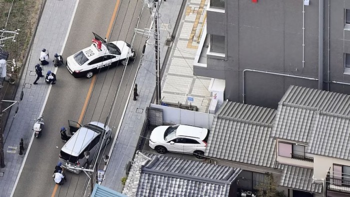 BERITA lokal sebelumnya melaporkan bahwa sekitar 10 staf kantor pos mungkin berada di dalam gedung. (AP Photo/Kyodo News)