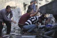 Israel mulai membombardir daerah kantong kecil tersebut sebagai bagian dari respons serangan Hamas pada 7 Oktober yang sudah menewaskan sedikitnya 1.400 orang, sebagian besar warga sipil, dan menculik lebih dari 200 orang. Serangan Hamas ini adalah yang paling mematikan dalam sejarah Israel. (AP Photo/Hatem Ali)