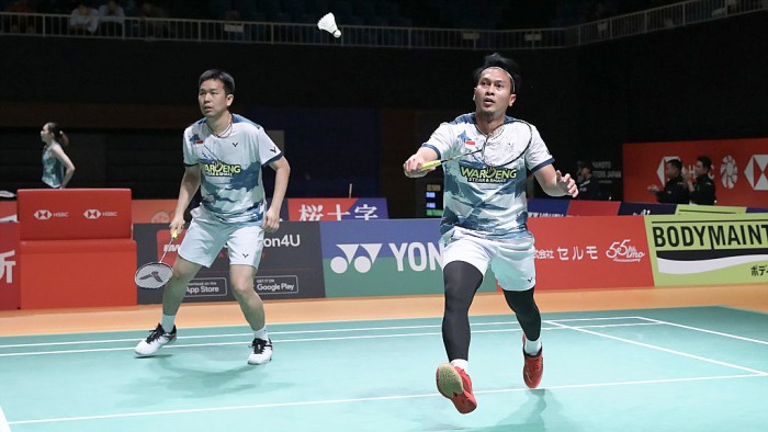 PASANGAN Ganda putra Indonesia Mohammad Ahsan/Hendra Setiawan dikalahkan wakil tuan rumah, Kenya Mitsuhashi/Hiroki Okamura, 16-21 dan 14-21 di babak pertama Japan Masters 2023. (PBSI)