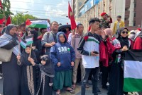 Ikatan Mahasiswa Muhammadiyah (IMM) bersama Ikatan Pelajar dan Pemuda Muhammadiyah (IPM) menggelar Aksi Bela Palestina, Jalan Lambung Mangkurat, Kota Banjarmasin, Jumat (10/11/2023).. (SuarIndonesia/YI)