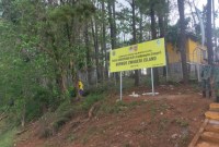 Pulau rusa menjadi konservasi ulin ditandai dengan penanaman ratusan bibit ulin, Selasa (28/11/2023).. (SuarIndonesia/Humas)