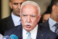 Menteri Luar Negeri Palestina Riyad Al Maliki mengatakan Israel tengah berupaya memusnahkan kehadiran bangsa Palestina sepenuhnya dari tanah air mereka sendiri. (AFP/Ahmad Gharabli)