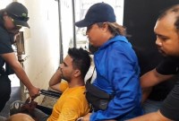 M Isra (38) terdakwa pembunuh terhadap Ahmad Zarkasi (51), dalam peristiwa di Kompleks Taekwondo Jalan Sultan Adam Banjarmasin Utara, saat ditangkap POlisi, dan kini divonis 12 tahun penjara, Selasa (5/12/2023). (SuarIndonesia/DO)