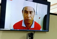 Terdakwa Muliadi mantan Kepala Desa Sawaja Kecamatan Candi Laras Utara Kabypaten Tapin, dituntut 15 bulan penjara. (SuarIndonesia/ HD)