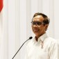Menko Polhukam Mahfud MD meminta Kemenkeu dan Jusuf Hamka duduk bersama untuk menyepakati jumlah utang yang harus dibayar. (CNNIndonesia/Andry N)