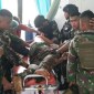 Proses evakuasi prajurit TNI diserang KKB di Maybrat, Papua Barat Daya. (istimewa)
