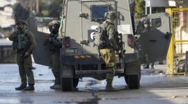 Tentara Israel terlihat saat operasi militer di Jenin, Tepi Barat, Rabu (13/12/2023). (AP Photo/Majdi Mohammed)