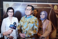 Ketua Umum BPHPI, Nani Indrawati (kiri) dan Ketua MA M Syarifuddin (tengah). [Foto: MJR]