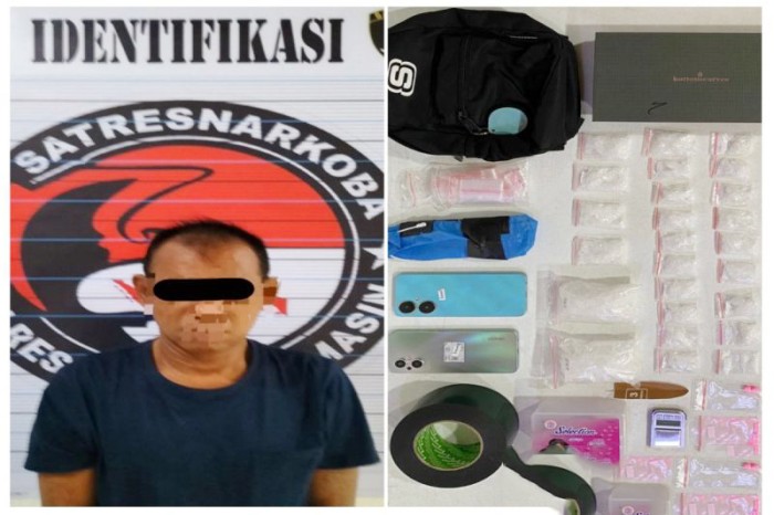 Tersangka RB dan barang bukti sabu-sabu seberat 319,89 gram diamankan Satresnarkoba Polresta Banjarmasin. [ANTARA/HO-Satrenarkoba Polresta Banjarmasin]