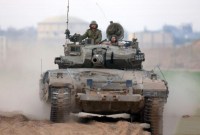 Tentara Israel terlihat di dekat perbatasan Jalur Gaza di Israel selatan pada Sabtu (6/1/2024). [Xinhua/JINI/Ilan Assayag]