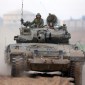 Tentara Israel terlihat di dekat perbatasan Jalur Gaza di Israel selatan pada Sabtu (6/1/2024). [Xinhua/JINI/Ilan Assayag]