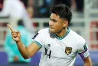 Bek timnas Indonesia, Asnawi Mangkualam melakukan selebrasi usai mencetak gol ke gawang Vietnam dalam lanjutan Piala Asia 2023 Grup D. [@Twitter/X]