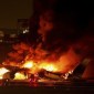 Pesawat Japan Airlines jenis Airbus terbakar usai menabrak pesawat Penjaga Pantai Jepang. [REUTERS/Issei Kato]