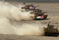 Sebuah pengangkut personel lapis baja Yordania dan tank-tank A.S. ikut serta dalam latihan militer multinasional 