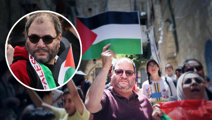 Anggota Parlemen Israel yang berhaluan kiri, Ofer Cassif tokoh anti—zionis tolak genosida -- pada protes Juni 2023 menentang rencana penggusuran sebuah keluarga Palestina di Yerusalem [Ahmad Gharabli/AFP via GETTY IMAGES; Edited: Truthout]