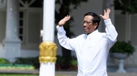 Mahfud MD merasa pengunduran dirinya dari Menko Polhukam sebagai bentuk etika. Namun, ia enggan menyinggung orang lain yang masih menjabat di kabinet. [ANTARA FOTO/Wahyu Putro A]