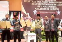 Komisi Pemilihan Umum Provinsi Kalimantan Selatan (KPU Kalsel) menggelar rapat pleno rekapitulasi penghitungan suara hasil Pemilu 2024 tingkat provinsi di Banjarmasin, Kamis (7/3/2024). [ANTARA/Firman]