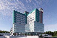 Progress pembangunan Rumah Sakit (RS) Amanah Medical Centre (AMC) sebagai gedung tertinggi di Banjarmasin utamanya, dan mungkin di Pulau Kalimantan pada umumnya, dengan fasilitas kesehatan yerlengkap. (SuarIndonesia/Ist)