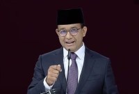 Anies Baswedan mengucapkan selamat kepada presiden terpilih Prabowo Subianto dan wakil presiden terpilih Gibran Rakabuming Raka. [Tangkapan layar youtube KPU RI]