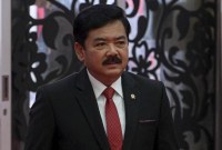 Menko Polhukam mengatakan menurut data PPATK, ada 3,2 juta warga yang main judi online. Di tiga bulan pertama 2024 saja, perputaran duit mencapai Rp100 triliun. [AFP/BAY ISMOYO]