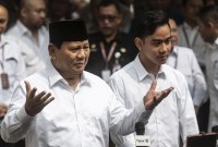 Presiden dan wakil presiden terpilih dari Pilpres 2024 Prabowo Subianto dan Gibran Rakabuming Raka saat hadir langsung di Gedung KPU, Jakarta Pusat. [ANTARA FOTO/Aprillio Akbar]
