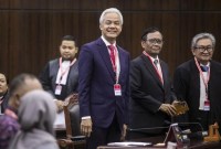 Ganjar Pranowo dan Mahfud MD mengucapkan selamat bekerja kepada Prabowo Subianto dan Gibran Rakabuming Raka yang akan menjadi presiden-wakil presiden. [CNNIndonesia/Adi Ibrahim]