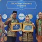 Paman Birin menerima Anugerah Adinata Syariah 2024 yang diselenggarakan oleh Komite Nasional Ekonomi dan Keuangan Syariah (KNEKS) di Aula Gedung Syariah Kawasan PIK 2 Jakarta,  Senin (20/5/2024). (SuarIndonesia/Adv)