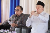 Afrizaldi, (kiri) dan H Muhidin