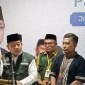 Kepala Kanwil Kemenag Kalsel Dr H Muhammad Tambrin saat menyampaikan keterangan keberangkatan haji Kloter 01 tahun 2024 di Asrama Haji di Kota Banjarbaru, Sabtu (11/5/2024). (SuarIndonesia/ANTARA/Sukarli)