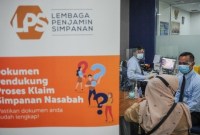 
Daftar 10 bank bangkrut sejak awal 2024. Mayoritas bank perkreditan rakyat (BPR) yang izinnnya telah dicabut oleh OJK. [ANTARA FOTO/RAISAN AL FARISI]