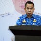 Sekdakot Banjarmasin Ikhsan Budiman saat membuka sosialisasi rancangan teknokratik rencana pembangunan jangka menengah daerah Kota Banjarmasin 2025-2029 di Banjarmasin, Rabu (19/6/2024). [ANTARA/Sukarli]