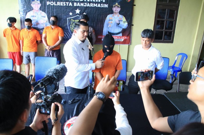 Tersangka SY, yang diamankan Polisi. (SuarIndonesia/YI)