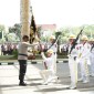 Upacara ditandai dengan berpindahnya Pataka 