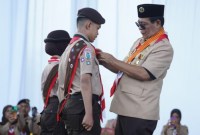 Gubernur Kalsel, H. Sahbirin Noor selaku Ketua Majelis Pembimbing Daerah (Mabida) Kwartir Daerah (Kwarda) Pramuka Kalsel, membuka resmi Kemah Besar Penggalang (Kemsarlang) Tingkat Daerah Kalsel Tahun 2024 di Alam Roh 20 Desa Kiram, Kabupaten Banjar, Kamis (27/6/2024). (SuarIndonesia/Adv)