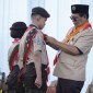Gubernur Kalsel, H. Sahbirin Noor selaku Ketua Majelis Pembimbing Daerah (Mabida) Kwartir Daerah (Kwarda) Pramuka Kalsel, membuka resmi Kemah Besar Penggalang (Kemsarlang) Tingkat Daerah Kalsel Tahun 2024 di Alam Roh 20 Desa Kiram, Kabupaten Banjar, Kamis (27/6/2024). (SuarIndonesia/Adv)
