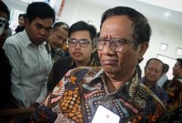 Mahfud MD mempertanyakan dasar MA memutuskan PKPU bertentangan dengan UU Pilkada. [CNN Indonesia]