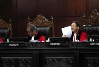 

Mahkamah Konstitusi mengabulkan gugatan Partai Demokrat soal dugaan penggelembungan suara PDIP di Pileg DPR RI dapil Banten II. [CNN Indonesia/Adi Ibrahim]