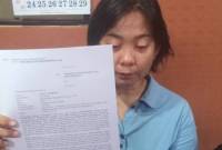 kakak korban perlihatkan bukti tulisan, Rabu (10/7/2024) SuarIndonesia/DO) 