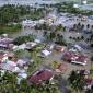 Foto udara banjir menggenangi rumah warga di Telaga Jaya, Kabupaten Gorontalo, Gorontalo, Sabtu (13/7/2024) lalu. [ANTARA FOTO/Adiwinata Solihin]