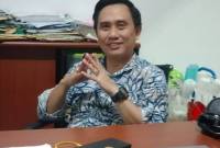 Rolly Muldiazi Adnan SH MH.