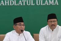 
Ketua Umum Pengurus Besar Nahdlatul Ulama (PBNU) Yahya Cholil Staquf (kiri) didampingi Sekjen PBNU Saifullah Yusuf (kanan). [ANTARA FOTO/AKBAR NUGROHO GUMAY]