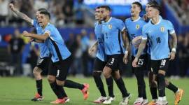 Pemain Uruguay selebrasi usai adu penalti dengan skor 4-3 (2-2) atas Kanada. Uruguay pun memastikan finis di peringkat ketiga Copa America 2024, Minggu (14/7/2024). [GRANT HALVERSON/GETTY IMAGES NORTH AMERICA/Getty Iamges via AFP]
