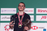 Pebulu tangkis tunggal putra Prancis, Alex Lanier di podium Japan Open 2024 di Yokohama Arena, Minggu (25/8/2024).(Xinhua/Zhang Xiaoyu)